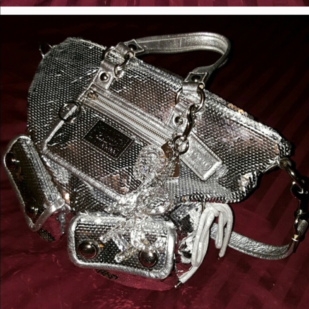 SOLD.  SOLD.  Coach poppy silver sequins
